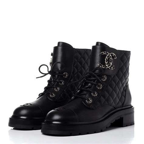 chanel black ankle boots with c on back|Chanel quilted combat boots.